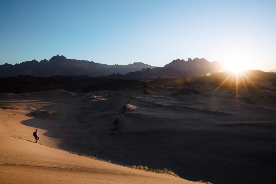 our-story Mesmerizing red sand dunes and endless mountain valleys providing iconic views across NEOM | NEOM, Saudi Arabia
